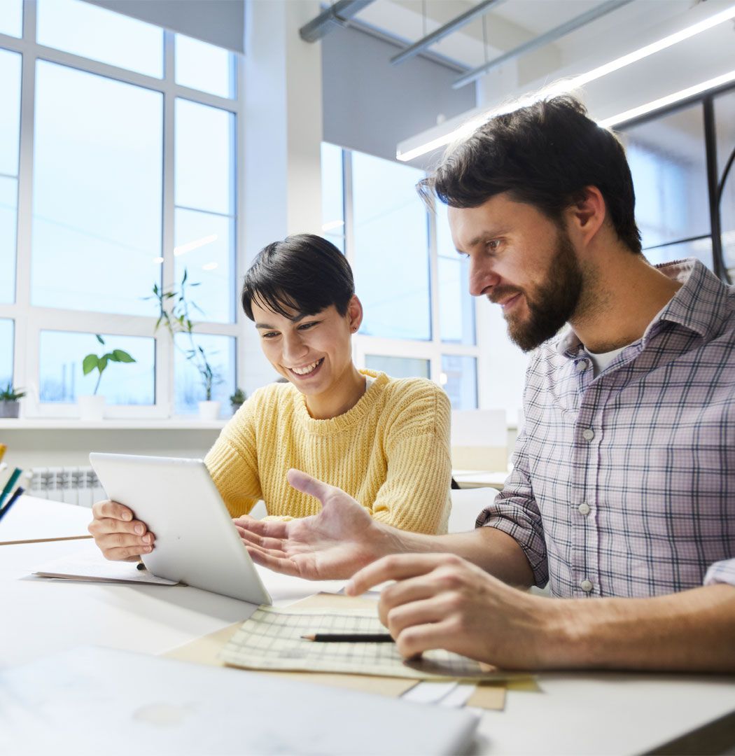 Accountant showing a business owner how to claim for R&D