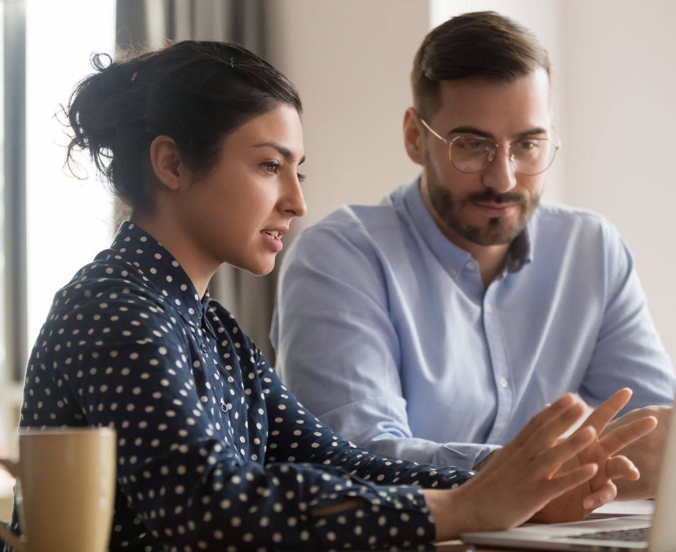 Accountant showing a business owner how to access their data