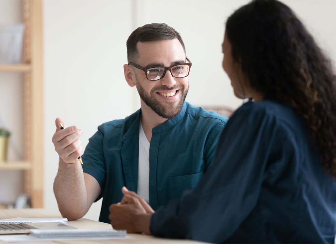 Accountants holding a discussion during a one-to-one meeting