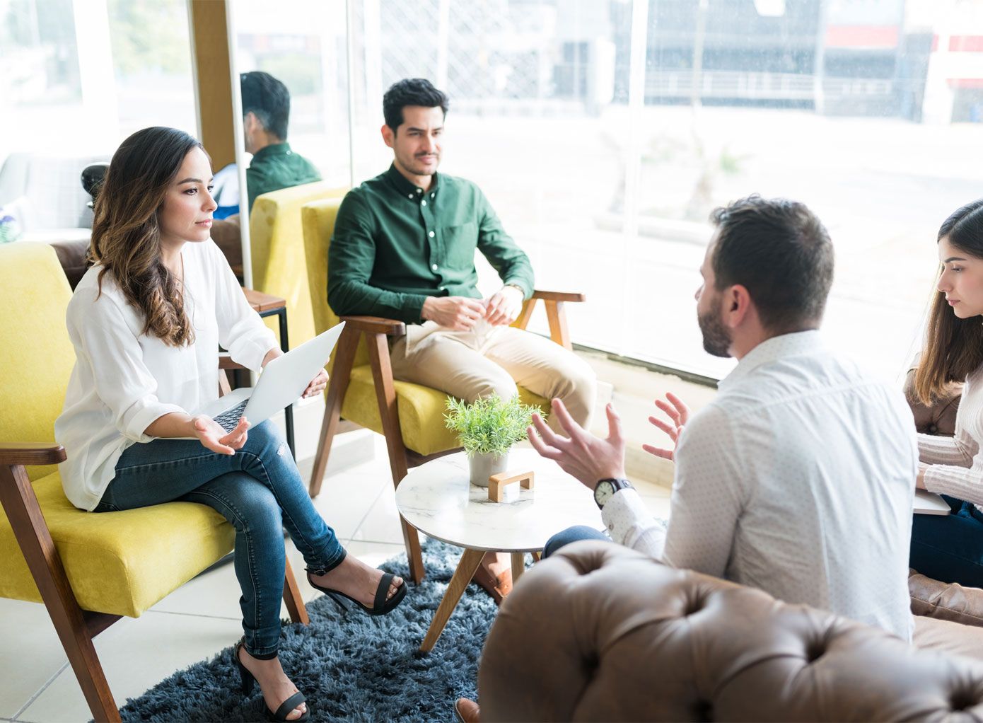 Accountants having a team meeting in a meeting room