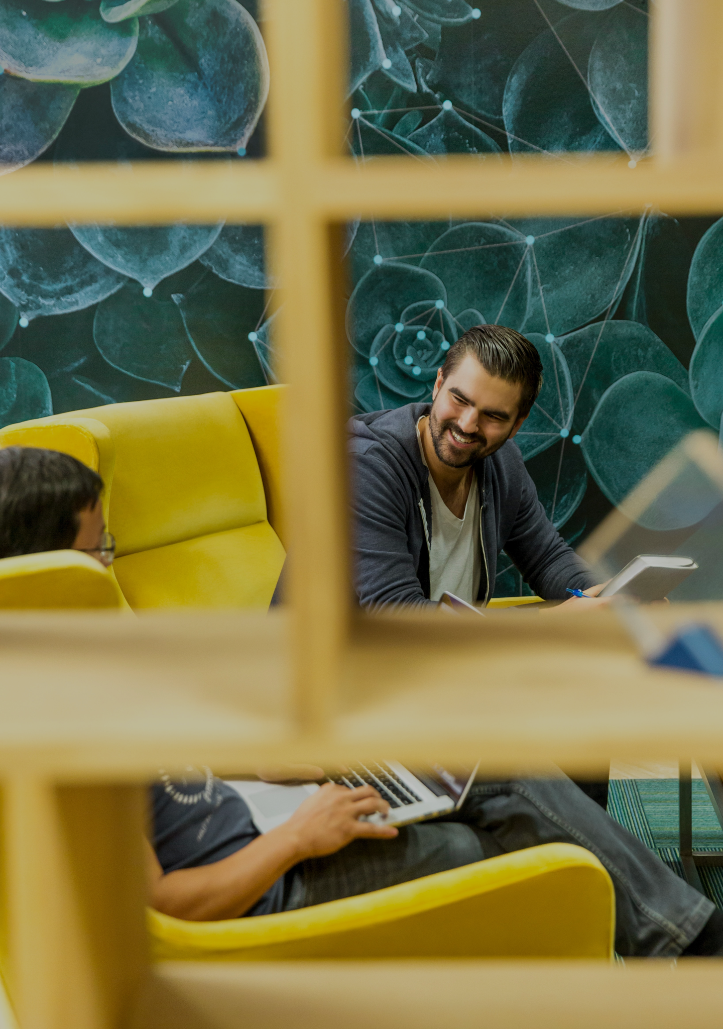 man smiling in office